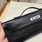 HERMES KELLY CUT 31 IN BLACK SHINY ALLIGATOR LEATHER WITH SILVER HARDWARE