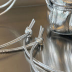 BOTTEGA VENETA SMALL CASSETTE BUCKET 18 IN SILVER METALLIC SOFT LAMBSKIN
