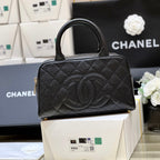 CHANEL 25S  QUILTED CAVIAR BOWLING BAG 27 IN BLACK CALFSKIN