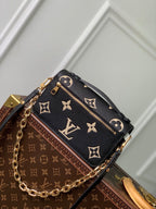 LOUIS VUITTON POCHETTE MÉTIS EAST WEST 21 IN BLACK AND BEIGE MONOGRAM EMPREINTE CALFSKIN EMBOSSED LOGO