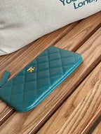 CHANEL CLASSIC SMALL 15 ZIPPED POUCH IN PINE GREEN GRAINED CALFSKIN