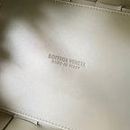 BOTTEGA VENETA SMALL 22 CASSETTE IN EICRU BEIGE LAMBSKIN