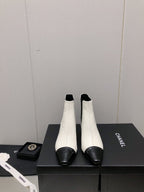 CHANEL SHORT BOOTS IN WHITE MIX BLACK SHEEPSKIN