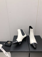 CHANEL SHORT BOOTS IN WHITE MIX BLACK SHEEPSKIN