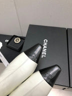 CHANEL SHORT BOOTS IN WHITE MIX BLACK SHEEPSKIN