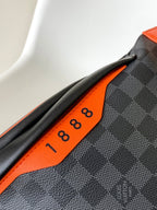 LOUIS VUITTON LV 25S BUMBAG 37 IN BLACK AND ORANGE COATED MONOGRAM CALFSKIN