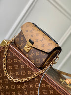 LOUIS VUITTON POCHETTE MÉTIS EAST WEST 21.5 IN BROWN MONOGRAM COATED CANVAS AND CALFSKIN