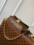 LOUIS VUITTON POCHETTE MÉTIS EAST WEST 21.5 IN BROWN MONOGRAM COATED CANVAS AND CALFSKIN