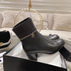 CHANEL MID-HEEL ANKLE BOOTS IN BLACK SMOOTH CALFSKIN
