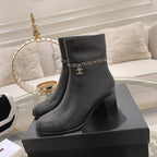 CHANEL MID-HEEL ANKLE BOOTS IN BLACK SMOOTH CALFSKIN