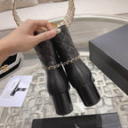 CHANEL MID-HEEL ANKLE BOOTS IN BLACK CALFSKIN