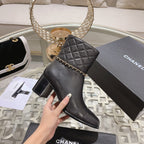 CHANEL MID-HEEL ANKLE BOOTS IN BLACK CALFSKIN
