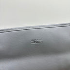 LEGER BACKPACK 37 IN GRAY GOYARDINE CANVAS WITH CALFSKIN TRIM
