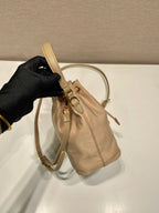 PRADA BUCKET BAG 19 IN BEIGE RE-NYLON AND SAFFIANO LEATHER HANDLE