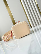 LOUIS VUITTON NANO NOÉ 16 IN WHITE MONOGRAM JACQUARD FABRIC AND BEIGE CALFSKIN TRIM