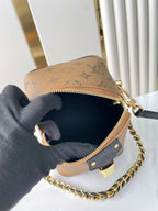 LOUIS VUITTON JUST IN CASE 14 IN BROWN MONOGRAM REVERSE CANVAS GOLD HARDWARE