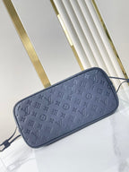 LOUIS VUITTON NEVERFULL MM 31 IN DARK NAVY MONOGRAM EMPREINTE LEATHER
