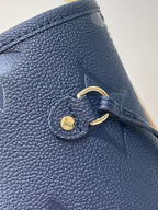 LOUIS VUITTON NEVERFULL MM 31 IN DARK NAVY MONOGRAM EMPREINTE LEATHER