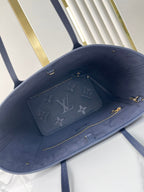 LOUIS VUITTON NEVERFULL MM 31 IN DARK NAVY MONOGRAM EMPREINTE LEATHER