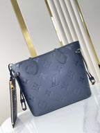 LOUIS VUITTON NEVERFULL MM 31 IN DARK NAVY MONOGRAM EMPREINTE LEATHER
