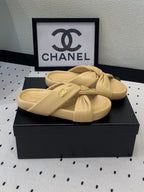 CHANEL TWISTED SLIPPERS IN DARK CREAM LAMBSKIN