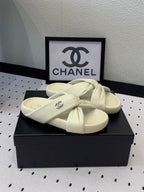 CHANEL TWISTED SLIPPERS IN WHITE LAMBSKIN