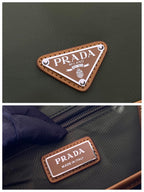 PRADA BACKPACK 45 IN SEAWEED GREEN RE-NYLON AND BROWN CALFSKIN TRIM