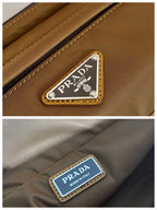 PRADA MESSENGER BAG 20 IN CIDER BROWN RE-NYLON AND CALFSKIN TRIM