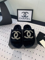 CHANEL THICK-SOLED SLIPPERS IN BLACK SHEEP WOOL