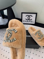 CHANEL THICK-SOLED SLIPPERS IN BRIGHT CREAM SHEEP WOOL