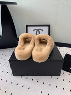 CHANEL THICK-SOLED SLIPPERS IN BRIGHT CREAM SHEEP WOOL