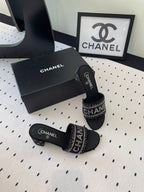 CHANEL RHINESTONE LETTER HIGH HEELS BLACK AND WHITE LAMBSKIN