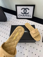 CHANEL SLIPPERS IN YELLOW CREAM CALFSKIN