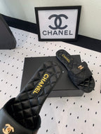 CHANEL SLIPPERS IN BLACK CALFSKIN