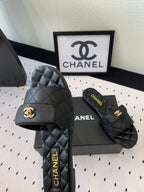 CHANEL SLIPPERS IN BLACK CALFSKIN