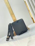 LOUIS VUITTON DICE 9 IN BROWN MONOGRAM AND MONOGRAM REVERSE CANVAS GOLD HARDWARE