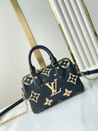 LOUIS VUITTON SPEEDY BANDOULIÈRE 20 IN BLACK CREAM MONOGRAM EMPREINTE LEATHER GOLD HARDWARE