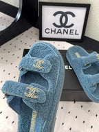CHANEL DAD SANDAL MULE IN AEGEAN BLUE LAMB FUR