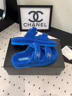 CHANEL DAD SANDAL MULE IN AZURE BLUE LAMB FUR