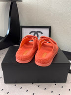 CHANEL DAD SANDAL MULE IN RED ORANGE LAMB FUR