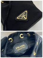 PRADA MINI BUCKET BAG 10 IN BLACK RE-NYLON AND SAFFIANO LEATHER STRAP