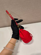 PRADA MINI BUCKET BAG 10 IN RED RE-NYLON AND SAFFIANO LEATHER STRAP