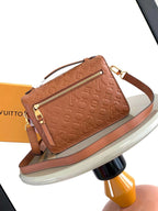 LOUIS VUITTON POCHETTE MÉTIS 25 IN COGNAC MONOGRAM EMPREINTE LEATHER GOLD HARDWARE