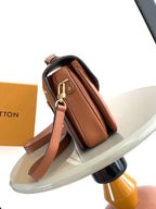 LOUIS VUITTON POCHETTE MÉTIS 25 IN COGNAC MONOGRAM EMPREINTE LEATHER GOLD HARDWARE