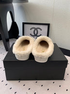 CHANEL FLAT MULE IN BEIGE SUEDE AND LAMB FUR LINING