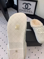 CHANEL FLAT MULE IN BEIGE SUEDE AND LAMB FUR LINING