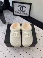 CHANEL FLAT MULE IN BEIGE SUEDE AND LAMB FUR LINING