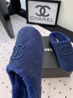 CHANEL FLAT MULE IN NAVY BLUE SUEDE AND LAMB FUR LINING