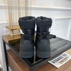 CHANEL SKI BOOTS IN BLACK QUILTED COTTON