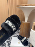DIOR THICK-SOLE SLIPPERS BLACK SHEARLING WITH EMBROIDERED LOGO